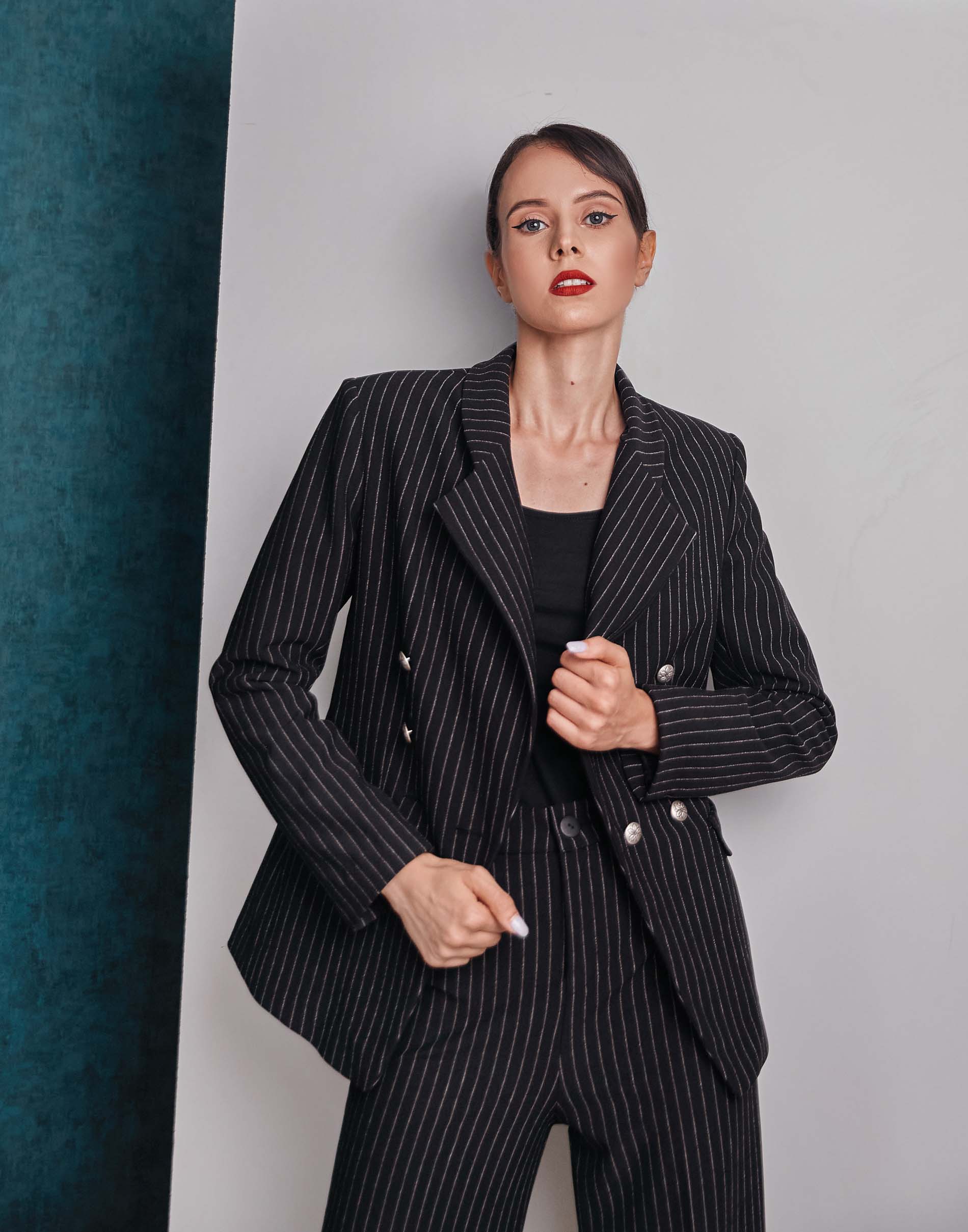 Pinstriped double breasted black blazer and black pant look