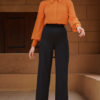 Two Pieces Orange Shirt With Buttons And Black Pants